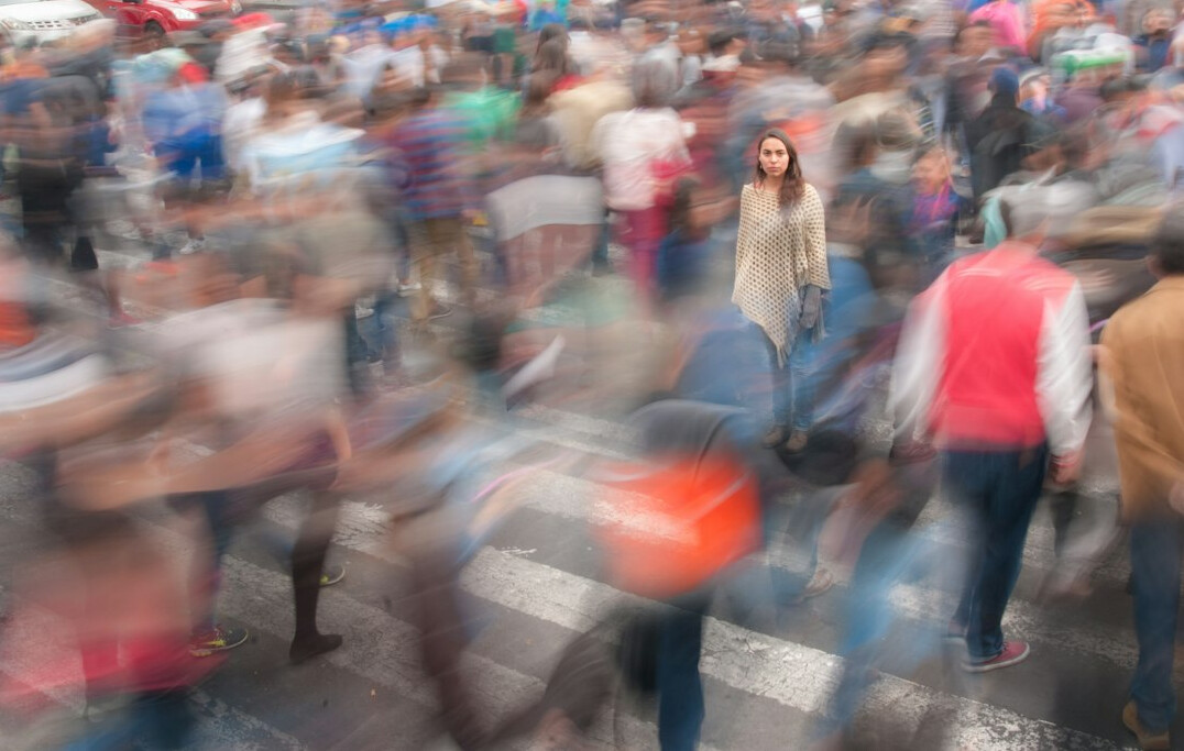 anxious people in crowd